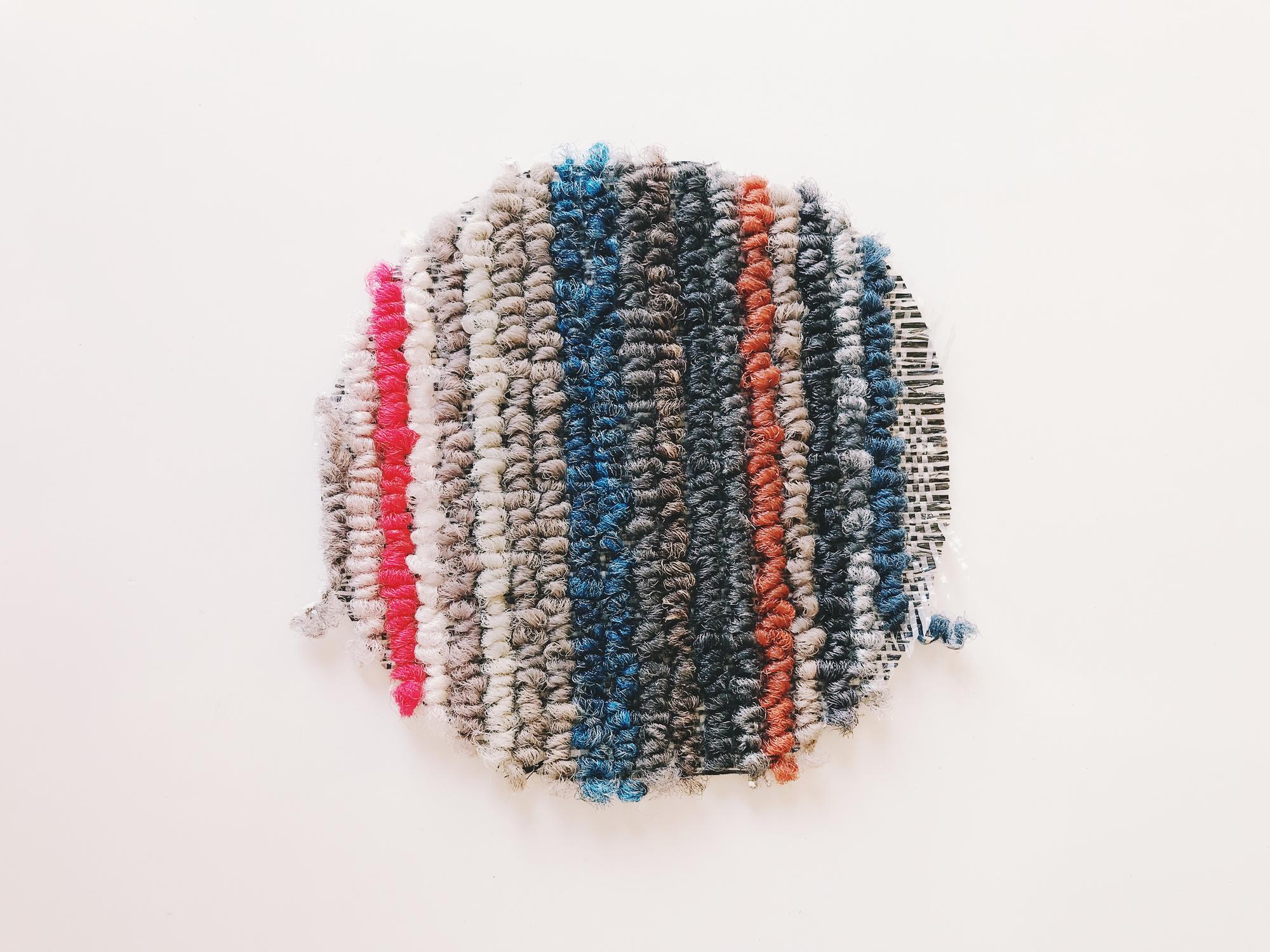 close-up of multicolor thread texture on patch